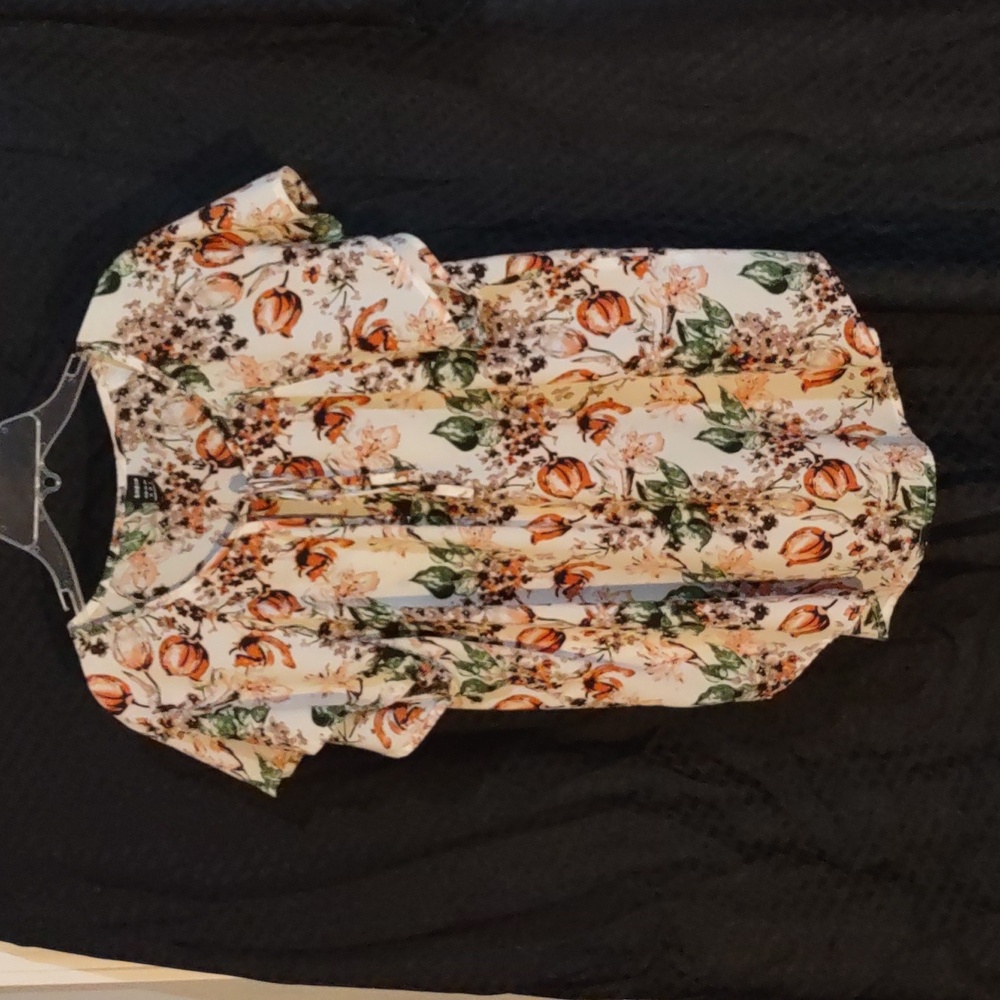 Woman's sleeveless floral blouse